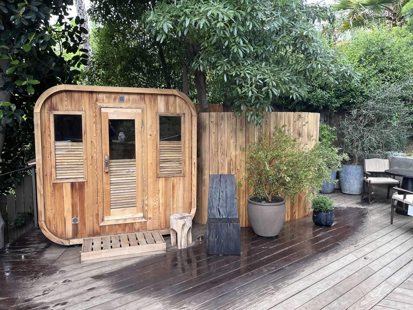 Barrel sauna beside the pool in Oakville